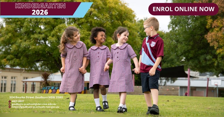 4 students holding hands smiling
